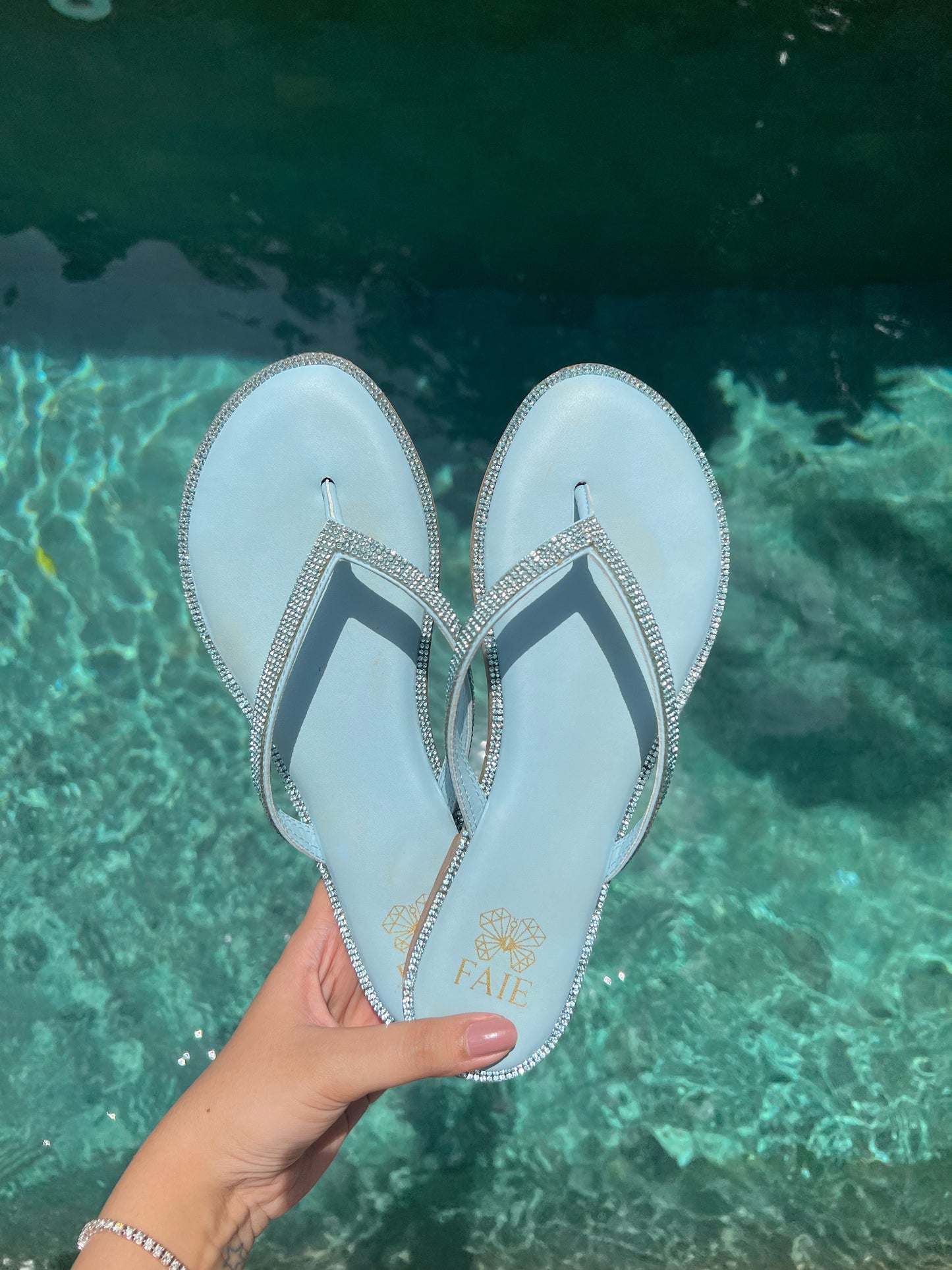 Aquamarine flip flops